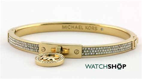 ladies michael kors pvd gold plated hinged bangle|Michael Kors charm bracelet.